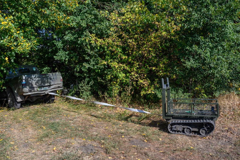 Illustrative image. A ground robot pulls a truck out of a forest, as Ukrainian Army soldiers of the 68th Separate Jaeger Brigade train on September 24, 2025, in the Pokrovsk direction, Ukraine. (Source: Getty Images)