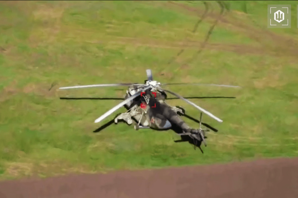 FPV targeting footage captures the moment a Ukrainian drone homes in on a Russian Mi-17 helicopter parked at a field landing strip in the Voronezh region. (Source: Getty Images)