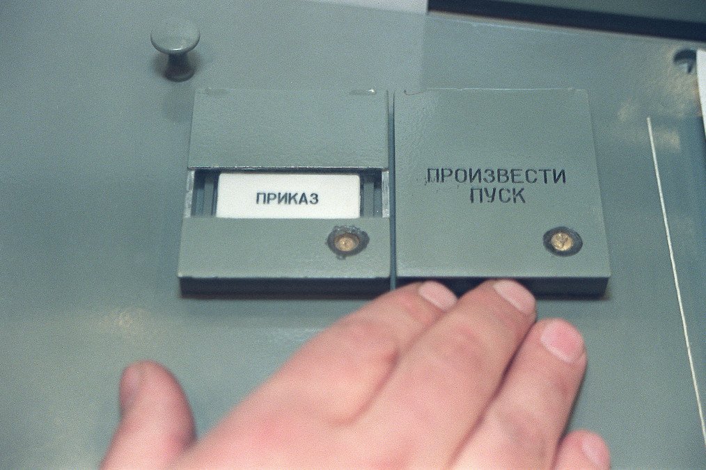 A Russian strategic nuclear forces officer stands near launch control buttons in an underground intercontinental ballistic missile command center in Drovyanaya, Siberia, March 20, 1992. (Source: Getty Images)