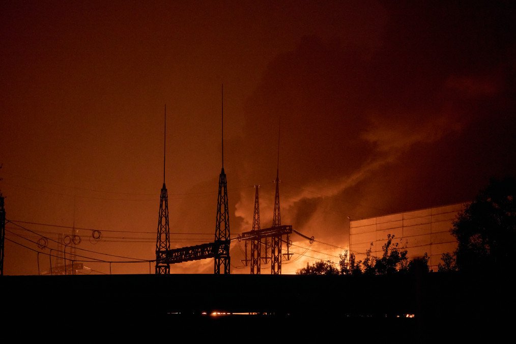 Firefighters battle flames at a thermal power plant following a series of explosions on October 10, 2025 in Kyiv, Ukraine. (Photo: Kostiantyn Liberov/Getty Images)