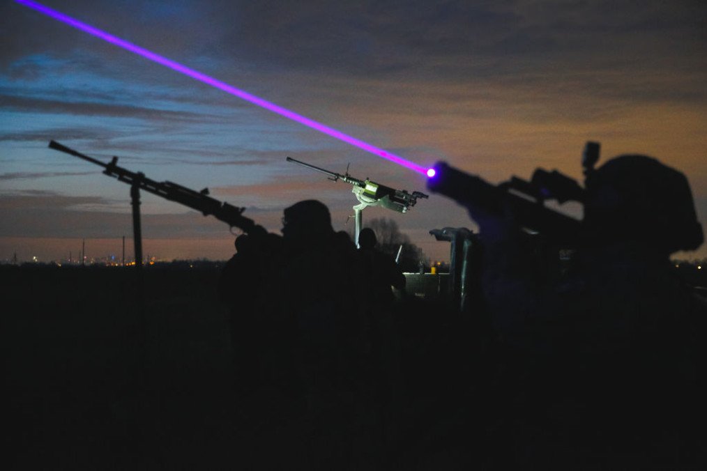 Ukrainian soldiers of the anti-aircraft mobile division stand with guns during night training on March 2, 2024 in Ukraine. (Source: Getty Images)