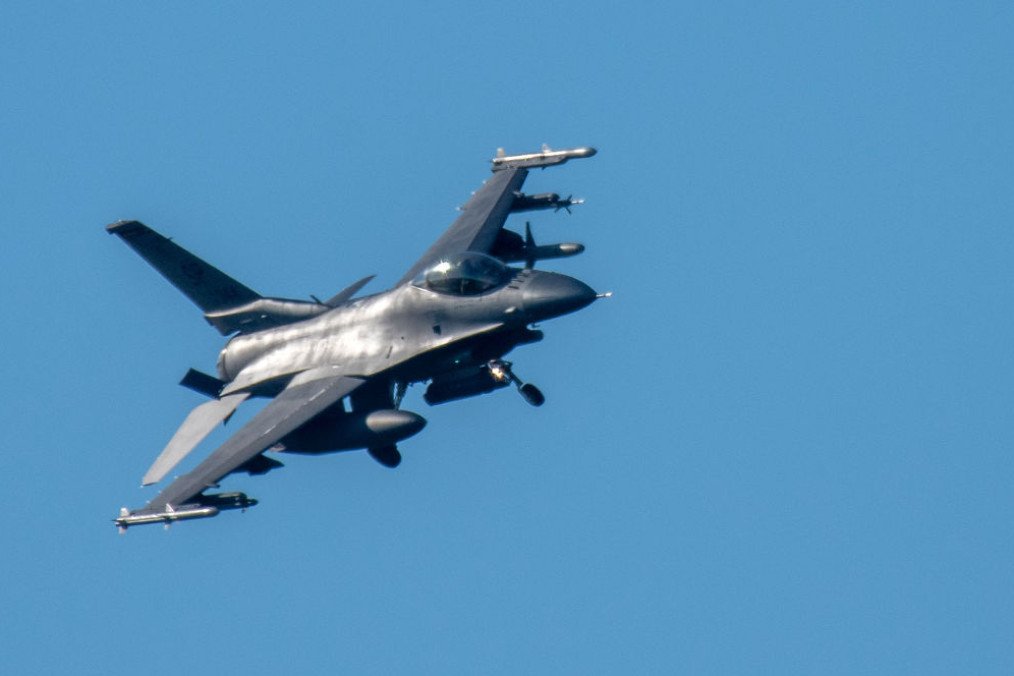 An F-16 Fighting Falcon fighter aircraft has its landing gear extended to land at the US military airfield at Spangdahlem. (Source: Getty Images)