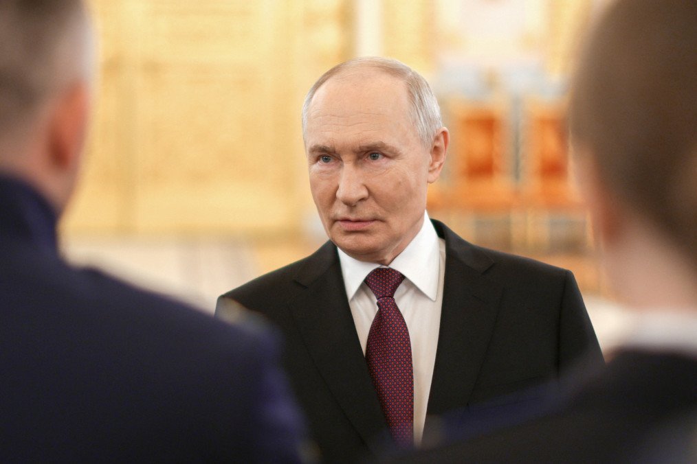 Russian leader Vladimir Putin talks to graduates of higher military educational institutions during a meeting at the Kremlin in Moscow on June 23, 2026. (Source: Getty Images)