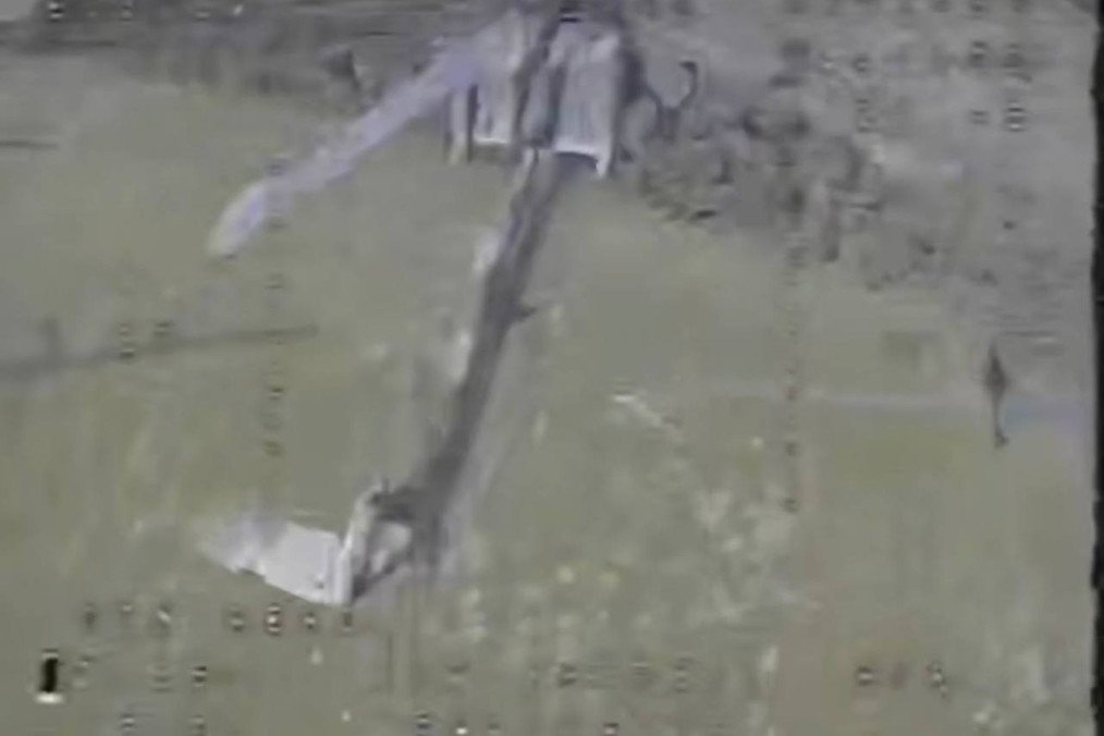 An FPV drone closes in on a Russian Mi-28 attack helicopter moments before impact over Russia's Belgorod region. (Source: SBS / Robert "Madyar" Brovdi)