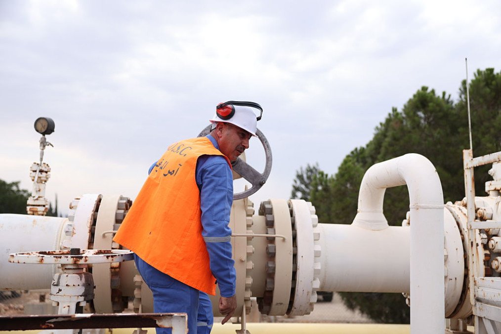 A worker operates a valve at the Jandar Gas Power Plant during the start of natural gas delivery from Azerbaijan to Syria via the Turkiye-Syria Natural Gas Pipeline on August 09, 2025. (Source: Getty Images)