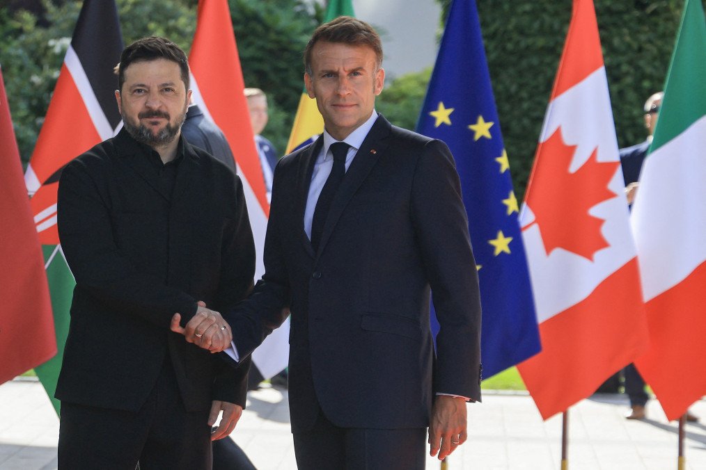 Zelenskyy Announces French Support for Chornobyl and Swiss Aid for Kyiv-Pechersk Lavra at G7 France's President Emmanuel Macron greets Ukraine's President Volodymyr Zelenskyy ahead of the working session with G7 leaders and Ukraine during the G7 summit, in Evian, France, on June 16, 2026. (Source: Getty Images)