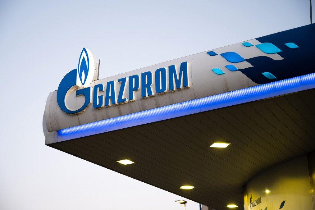 Company brand logo for PJSC Gazprom outside a fuel station. (Source: Getty Images)