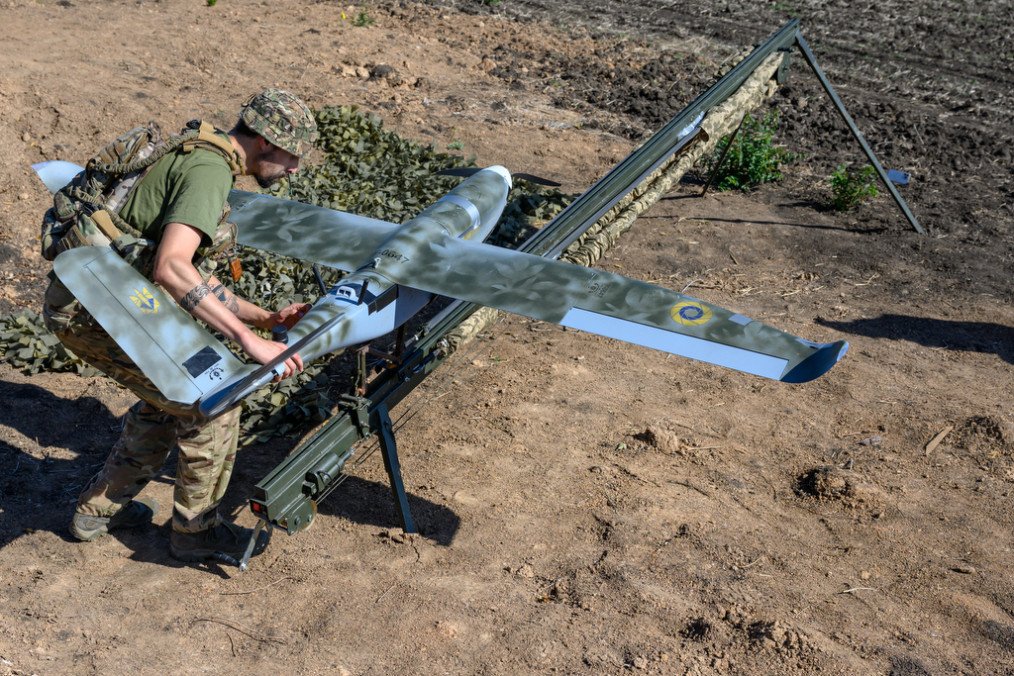Ukrainian Army drone squad leader of the 148th Separate Artillery Brigade prepares to launch a drone for flight over Russian-occupied areas of the Donetsk region on September 21, 2025, in the Novopavlivka direction, Ukraine. (Source: Getty Images)