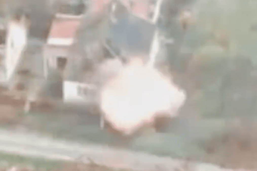 Ukraine’s HUR Releases Rare Footage of Belarusian Volunteers Crippling Russian Forces in Zaporizhzhia An explosion captured on drone footage during a strike on Russian positions near residential buildings on the Zaporizhzhia front. (Photo: Ukraine’s Defense Intelligence)