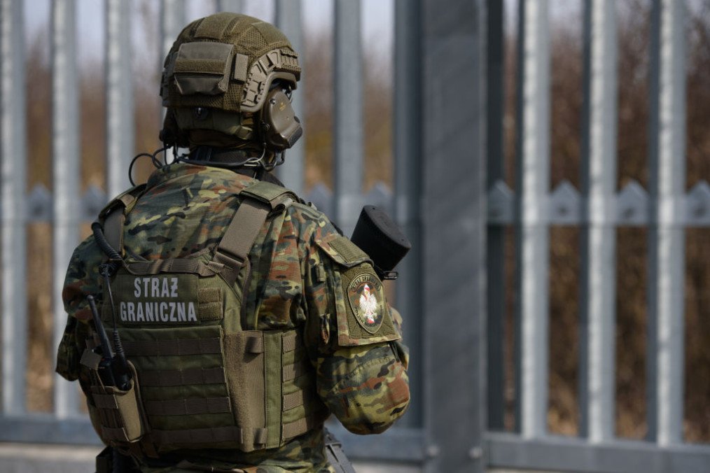 A soldier of the Polish Border Guard is seen as he stays guard before the Prime Minister’s visit on the Polish-Belarusian border in Ozierany Male, Poland on March 22, 2025. (Source: Getty Images)