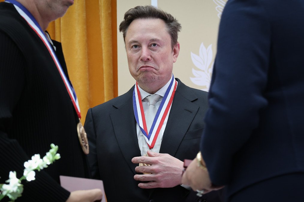 Tesla and SpaceX CEO Elon Musk reacts after being awarded the National Medal of Science during the Golden Age of American Innovation Summit at the Institute of Peace on October 08, 2026, in Washington, DC. (Source: Getty Images) Tesla and SpaceX CEO Elon Musk reacts after being awarded the National Medal of Science during the Golden Age of American Innovation Summit at the Institute of Peace on October 08, 2026, in Washington, DC. (Source: Getty Images)