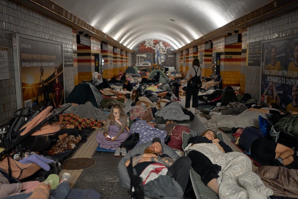 Local residents take shelter and sleep inside a subway station during an air raid alert in the early hours of August 20, 2026 in Kyiv, Ukraine. (Source: Getty Images)
