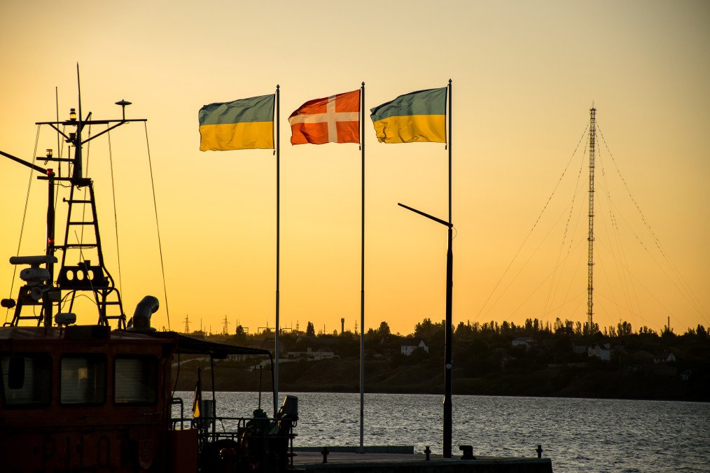 The flags of Ukraine and Denmark flutter against the background of the sunset on September 9, 2023, in Mykolaiv, Ukraine.