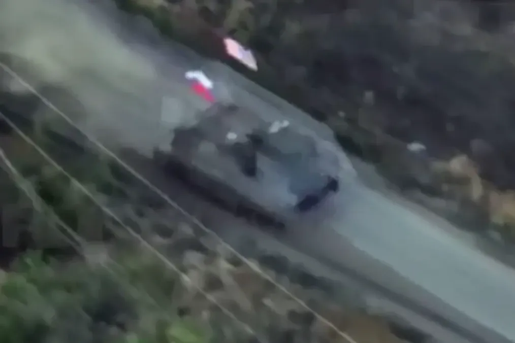 Russian Troops Roll Into Battle Flying US Flag on Captured American M113, Video