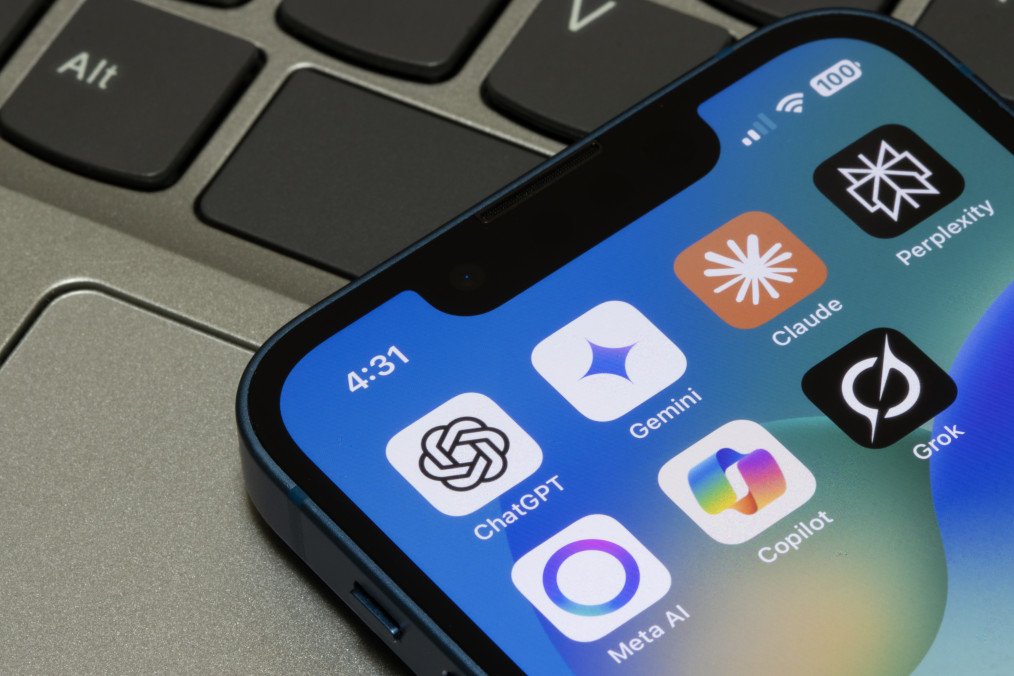 Assorted AI apps, including ChatGPT, Gemini, Claude, Perplexity, Meta AI, Microsoft Copilot, and Grok, are seen on the screen of an iPhone. Illustrative photo. (Source: Getty Images)