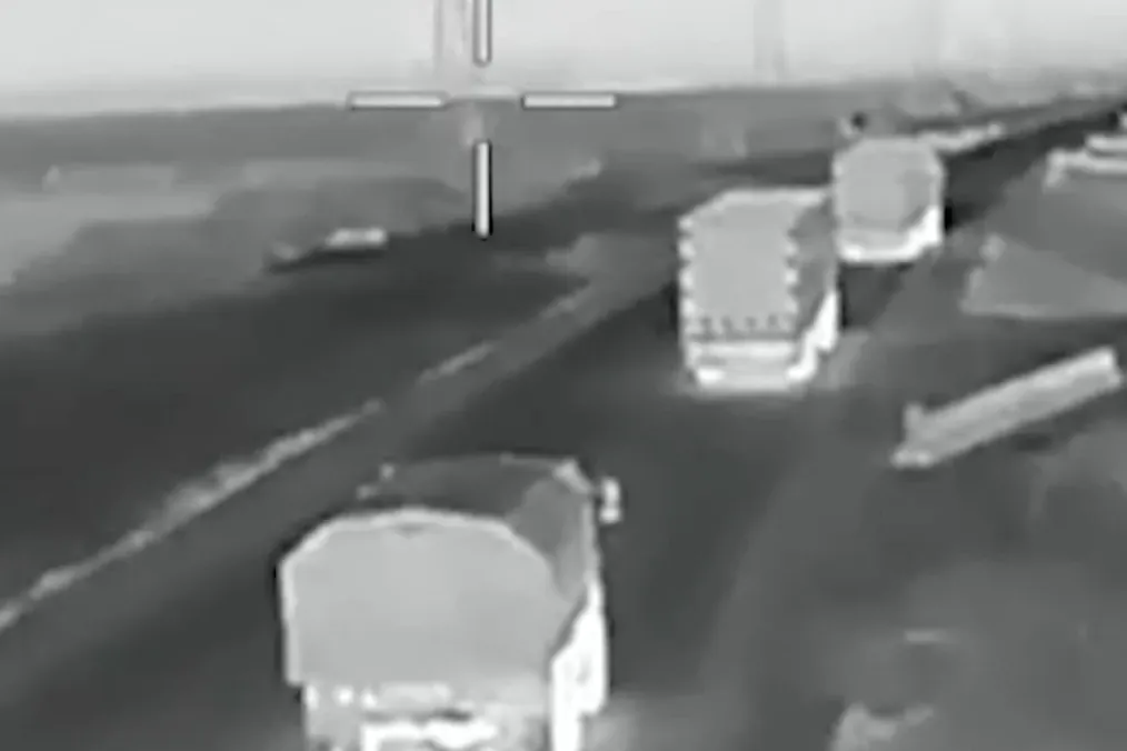 Russian military trucks travel along the Mariupol–Crimea highway before reportedly being targeted by Ukrainian drones. (Source: 412th Nemesis Brigade) Russian military trucks travel along the Mariupol–Crimea highway before reportedly being targeted by Ukrainian drones. (Source: 412th Nemesis Brigade)