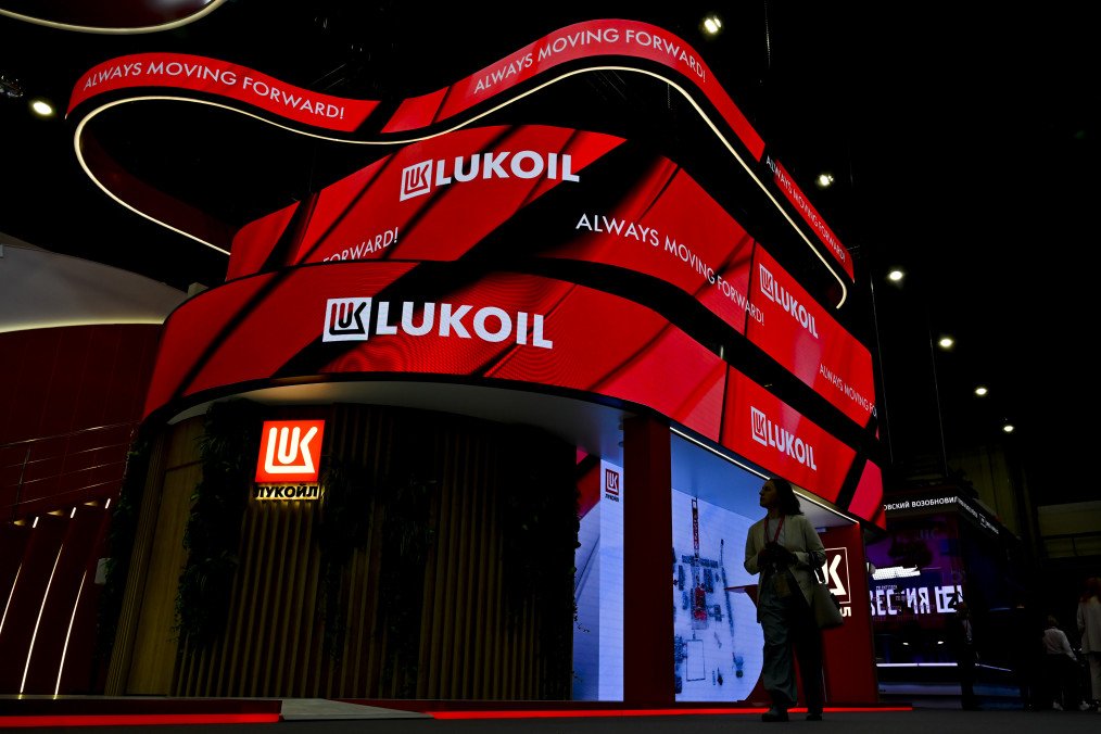 Hungary Seeks to Circumvent US Sanctions on Russian Oil Giants Lukoil and Rosneft A booth of Lukoil, a leading Russian oil company, is seen during the 28th St. Petersburg International Economic Forum in St. Petersburg, Russia on June 18, 2025. (Source: Getty Images)