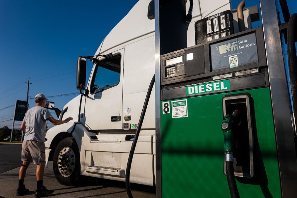 A gas station employee fills a truck up with diesel fuel on October 16, 2026 in Bayonne, New Jersey. (Source: Getty Images)