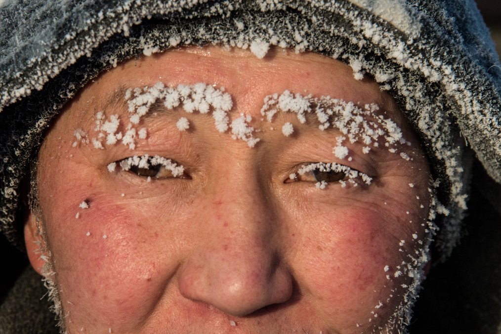 Villagers in Yakutia, a part of Siberia located not far from the Chinese border, cut ice blocks from a frozen lake near Oy to collect drinking water during extreme winter cold, November 27, 2018. (Source: Getty Images) Villagers in Yakutia, a part of Siberia located not far from the Chinese border, cut ice blocks from a frozen lake near Oy to collect drinking water during extreme winter cold, November 27, 2018. (Source: Getty Images)