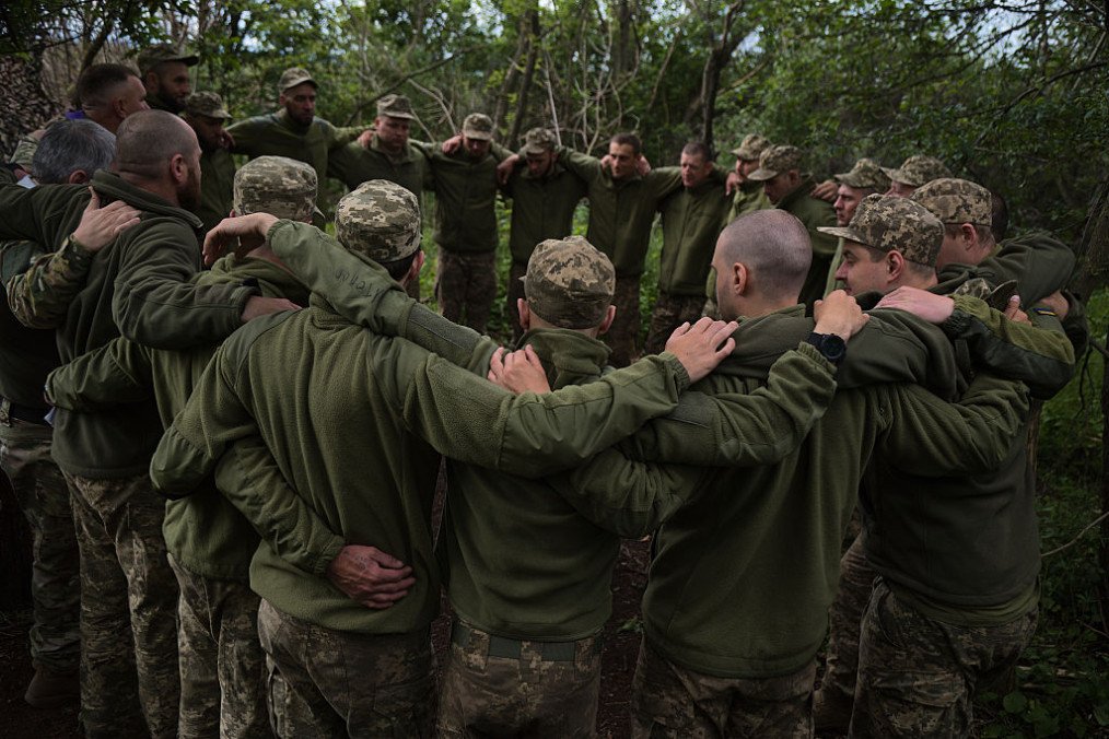 Servicemen of the Armed Forces of Ukraine attend a Trinity Day service led by chaplains of the 93rd Mechanized Brigade at an undisclosed location in the Donetsk region on May 31, 2026 in UNSPECIFIED, Ukraine. (Source: Getty Images) Servicemen of the Armed Forces of Ukraine attend a Trinity Day service led by chaplains of the 93rd Mechanized Brigade at an undisclosed location in the Donetsk region on May 31, 2026 in UNSPECIFIED, Ukraine. (Source: Getty Images)