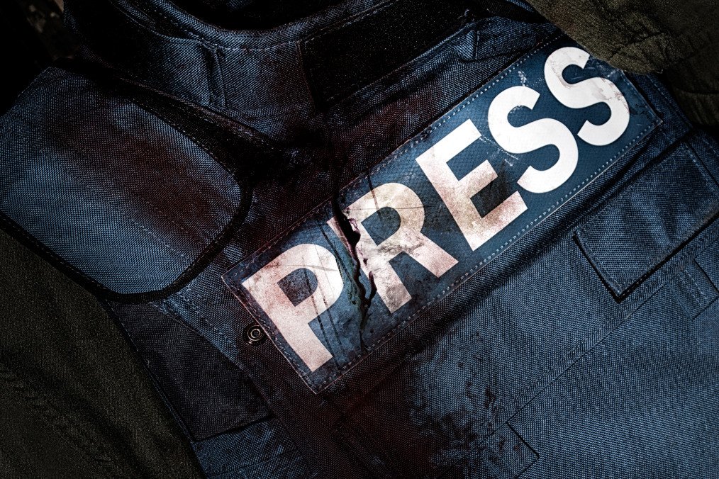 Press journalist armor war protective vest in blood. Illustrative photo. (Source: Getty Images)