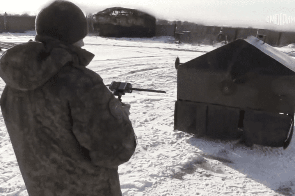 A Russian soldier operates an experimental ground robotic vehicle fitted with a “fan-style” anti-drone defense system—utilizing rapidly rotating cables—during tests in the occupied Zaporizhzhia region. (Source: Russian media)
