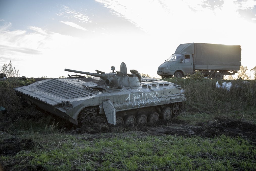 A Ukrainian military vehicle drives by a Russian military armored vehicle left aside a road in the frontline near Druzhelyubivka city, Kharkiv region, Ukraine, October 8th, 2022. (Source: Getty Images) A Ukrainian military vehicle drives by a Russian military armored vehicle left aside a road in the frontline near Druzhelyubivka city, Kharkiv region, Ukraine, October 8th, 2022. (Source: Getty Images)