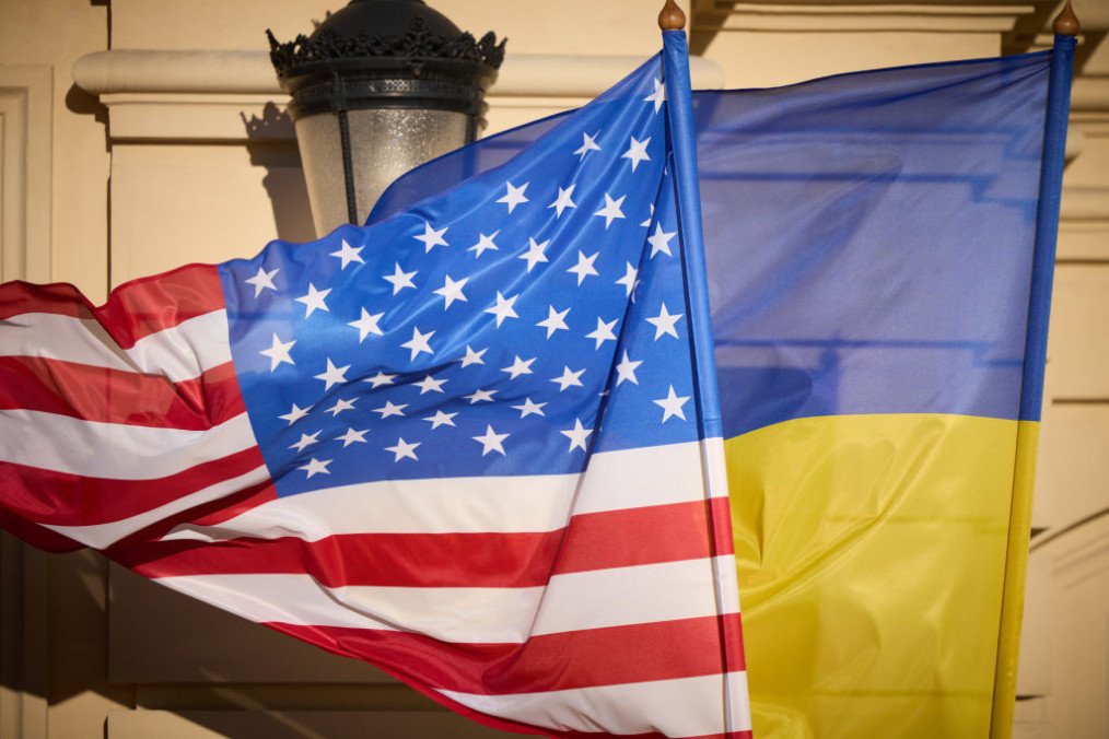 The national flag of the United States of America and Ukrainian flag are seen during a daily demonstration of solidarity with Ukraine in Krakow, Poland. (Source: Getty Images)