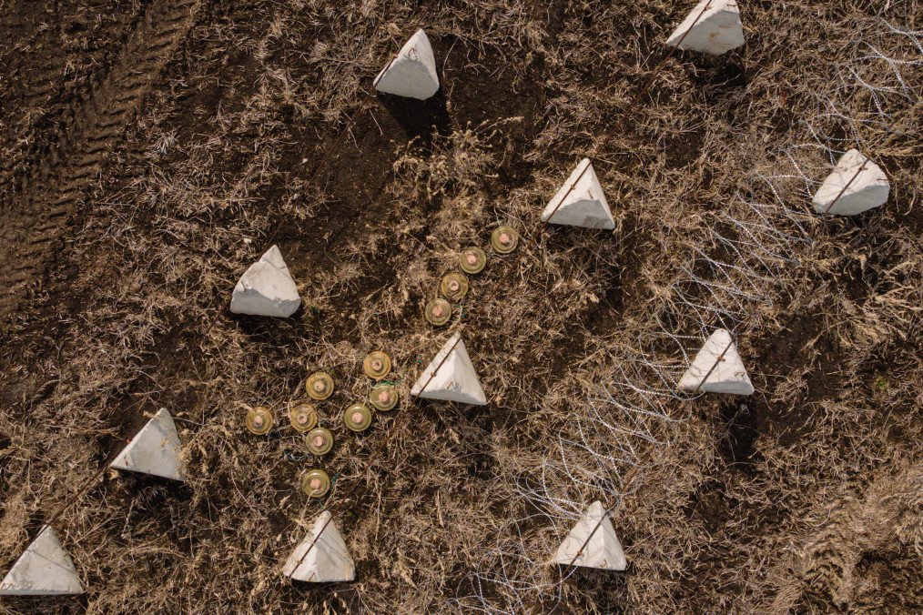 Barbed wire, dragon’s teeth anti-tank obstacles, and mines are seen along a fortification line on March 13, 2025, in the Kharkiv region, Ukraine. Barbed wire, dragon’s teeth anti-tank obstacles, and mines are seen along a fortification line on March 13, 2025, in the Kharkiv region, Ukraine.