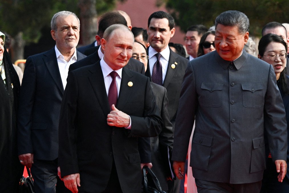 Russia's leader Vladimir Putin walks with China's President Xi Jinping. (Source: Getty Images) Russia's leader Vladimir Putin walks with China's President Xi Jinping. (Source: Getty Images)