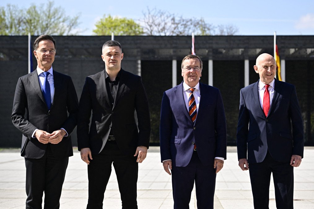 Rutte Urges Allies to Boost Ukraine Defense Funding by $60 Billion NATO Secretary General Mark Rutte, Ukraine's Defense Minister Mykhailo Fedorov, German Defense Minister Boris Pistorius and Britain's Defense Secretary John Healey prior to a Ramstein meeting on April 15, 2026. (Source: Getty Images)