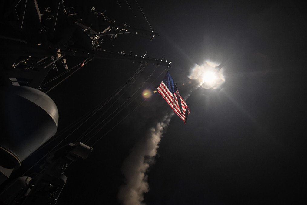 The guided-missile destroyer USS Porter fires a Tomahawk land attack missile on April 7, 2017, in the Mediterranean Sea. (Source: Getty Images)