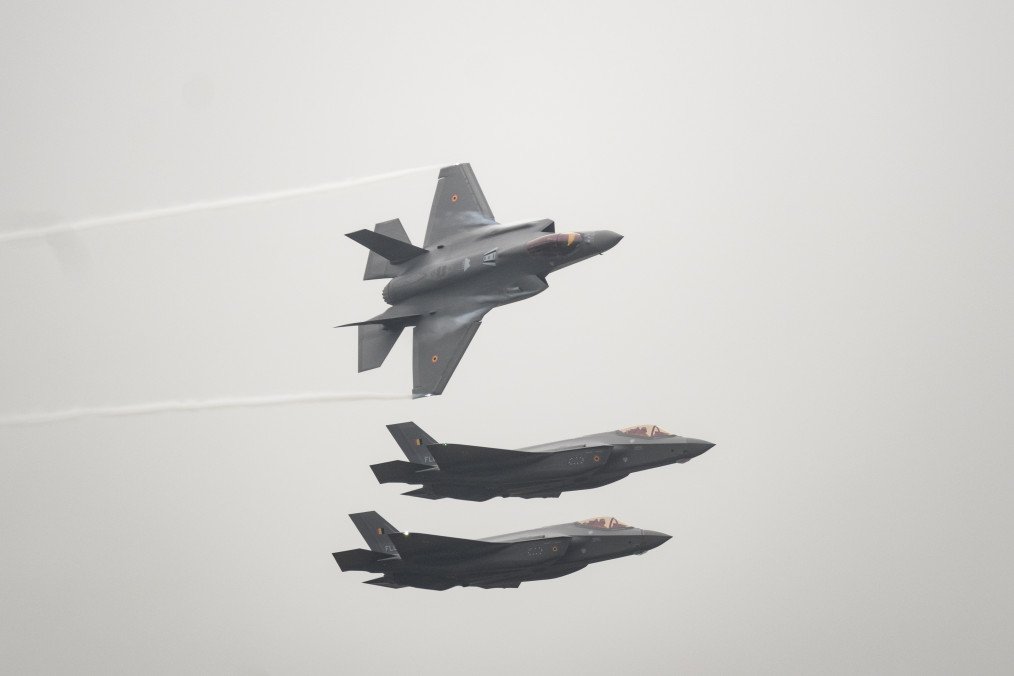Belgium's newly purchased Lockheed Martin F-35 Lightning II fighter jets fly as they arrive at the Florennes Air Base on October 13, 2025 in Brussels, Belgium. Illustrative photo. (Source: Getty Images)