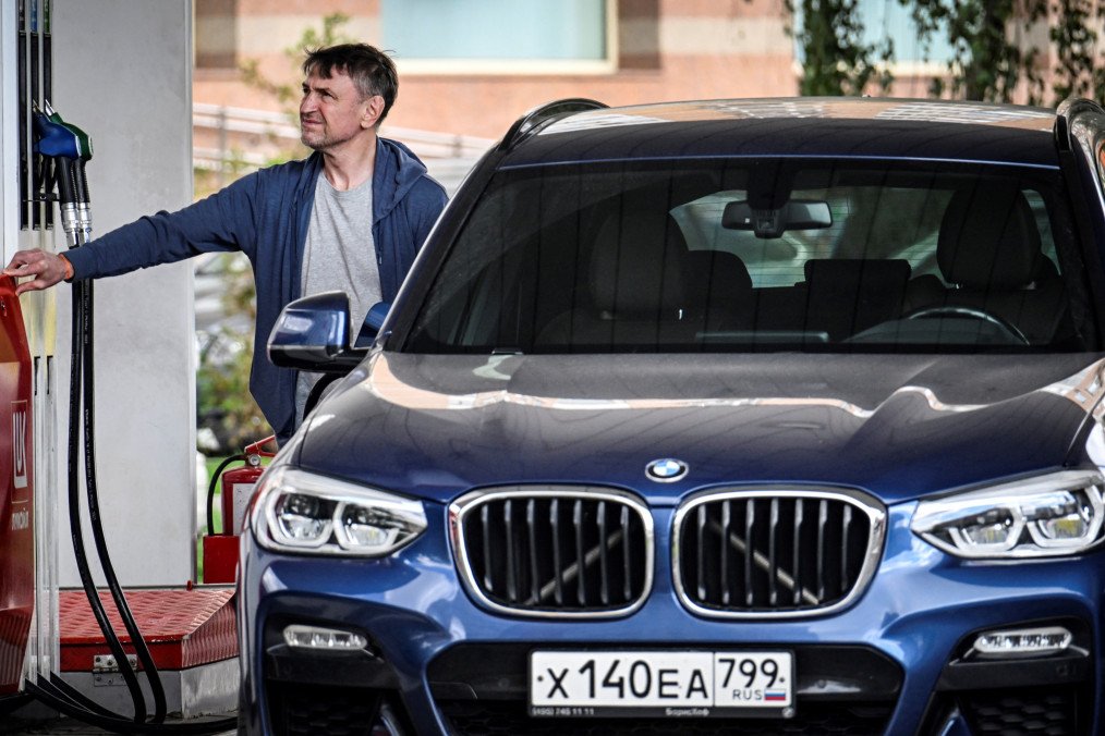 A man fills up his car at a gas station in Moscow on September 8, 2025. A man fills up his car at a gas station in Moscow on September 8, 2025.