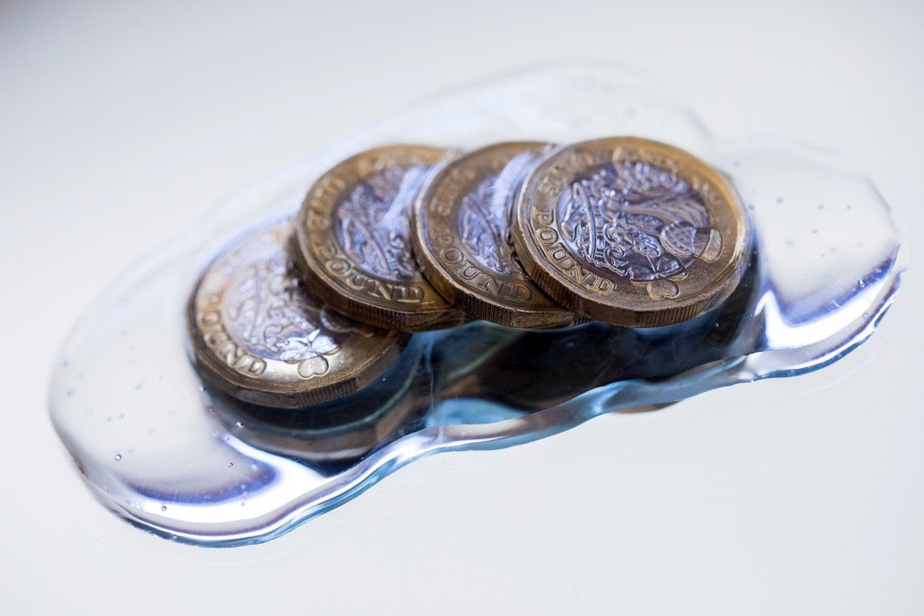 Illustrative image. British one-pound coins sit in hand sanitizing gel in this arranged photograph in Danbury, UK, on March 23, 2020. (Source: Getty Images) Illustrative image. British one-pound coins sit in hand sanitizing gel in this arranged photograph in Danbury, UK, on March 23, 2020. (Source: Getty Images)