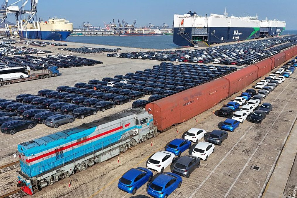 Chinese-made automobiles are transported by railway to the Yantai Port for assembly and wait to be loaded onto ships for export in Yantai City, Shandong Province, China, on January 28, 2026. (Photo by Costfoto/NurPhoto via Getty Images)