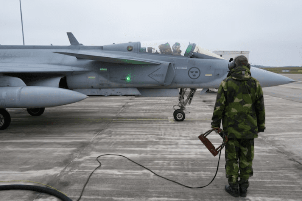 Sweden Deploys Fighter Jets and Corvettes to Help Defend Finland’s Borders A Swedish Air Force ground crew member stands next to a JAS 39 Gripen fighter jet in Kallinge, Sweden. (Source: Reuters)