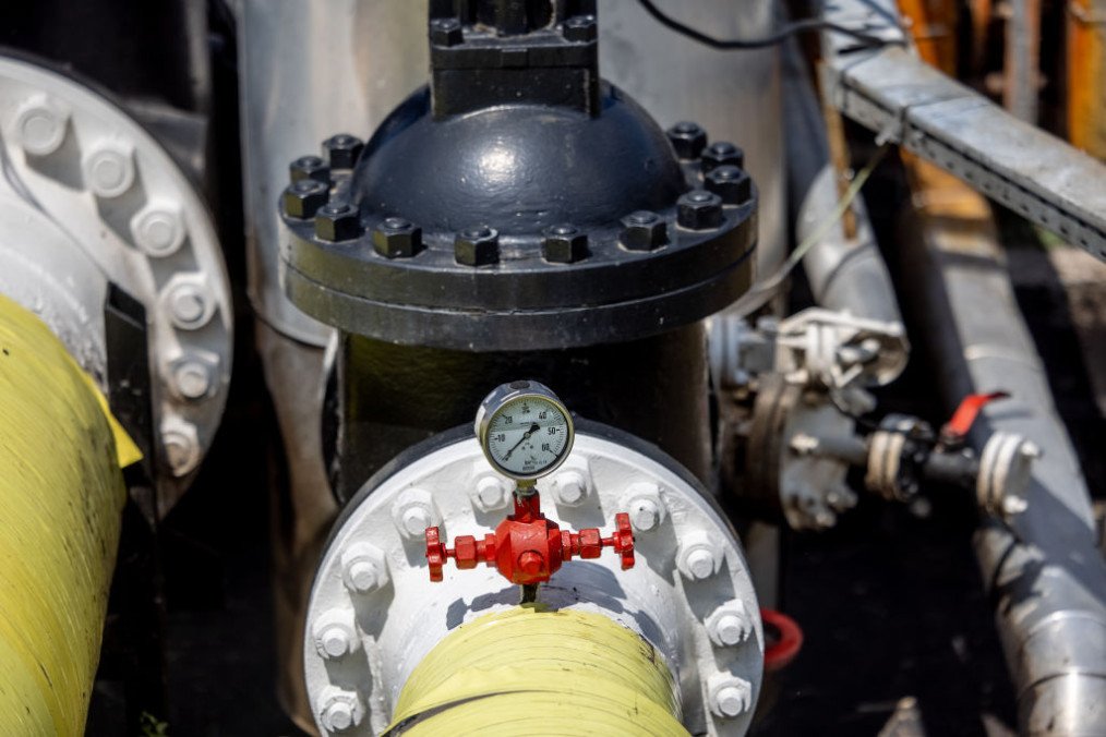 A pressure gauge sits on an oil transportation pipe in the Duna oil refinery in Szazhalombatta, Hungary. (Source: Getty Images)