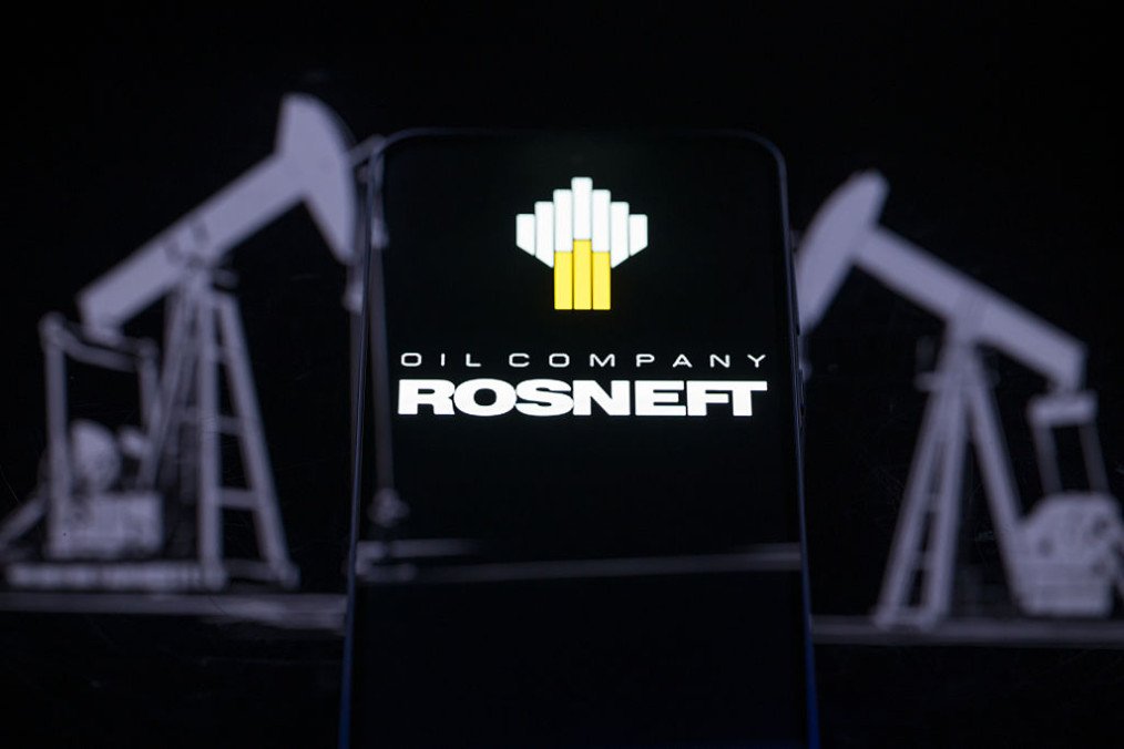 The Rosneft Oil Company logo is displayed on a smartphone screen in this photo illustration. (Source: Getty Images)