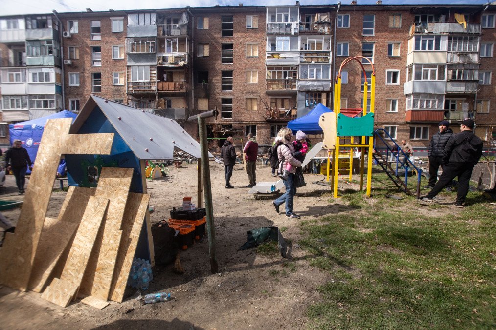 Wooden boards cover windows at a children's playground following a drone strike in Sumy, Ukraine, on April 11, 2026. (Source: Getty Images)