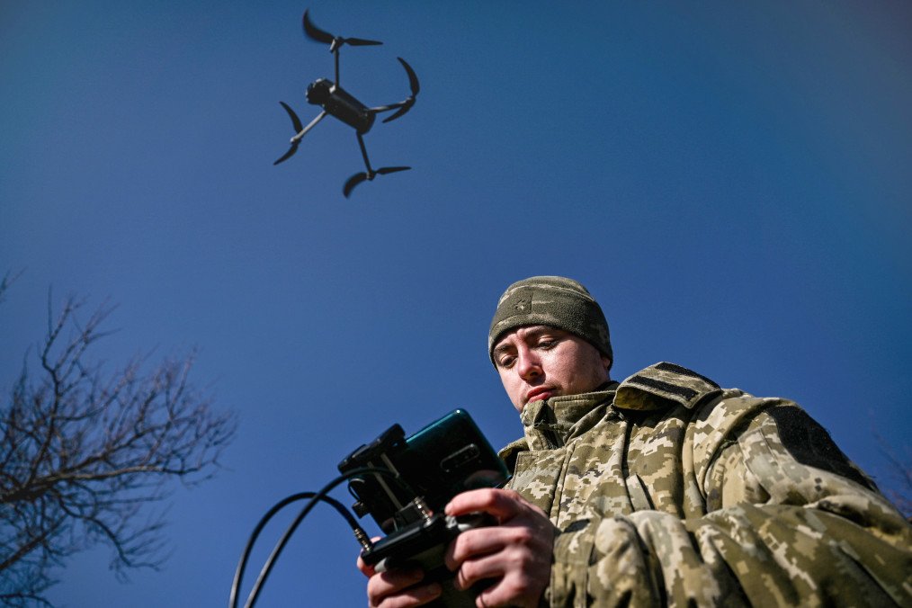 A Ukrainian serviceman sharpens his drone-flying skills during a training session. A Ukrainian serviceman sharpens his drone-flying skills during a training session.
