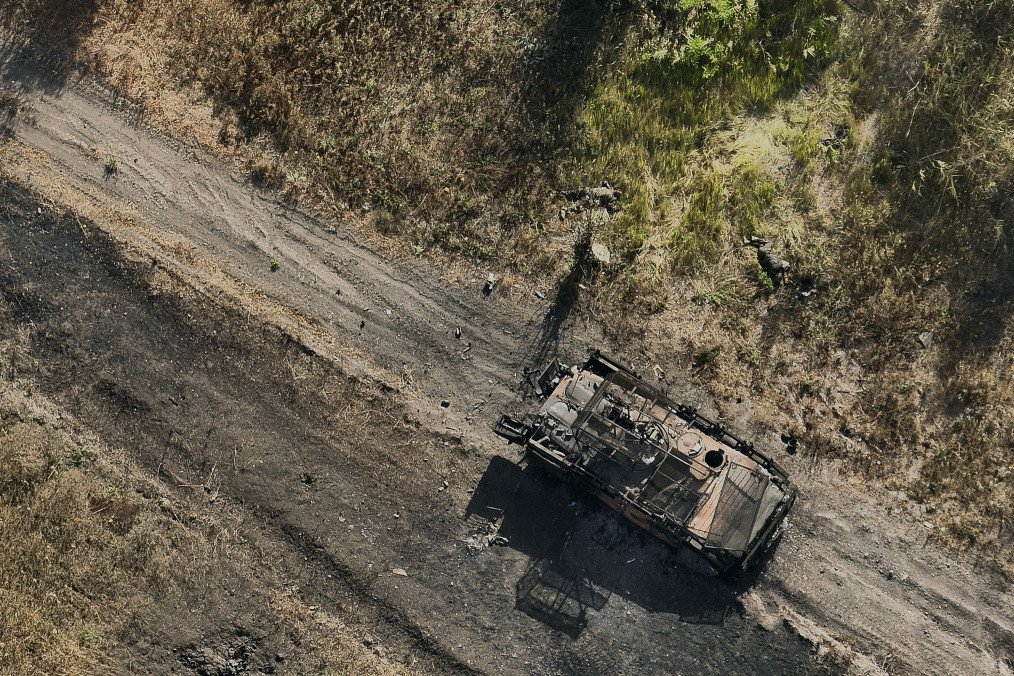 An aerial view of bodies of Russian soldiers and a destroyed Russian armored vehicle after the assault on a small settlement of Tsukurine on September 30, 2024, on the Pokrovsk frontline, Ukraine. (Source: Getty Images) An aerial view of bodies of Russian soldiers and a destroyed Russian armored vehicle after the assault on a small settlement of Tsukurine on September 30, 2024, on the Pokrovsk frontline, Ukraine. (Source: Getty Images)