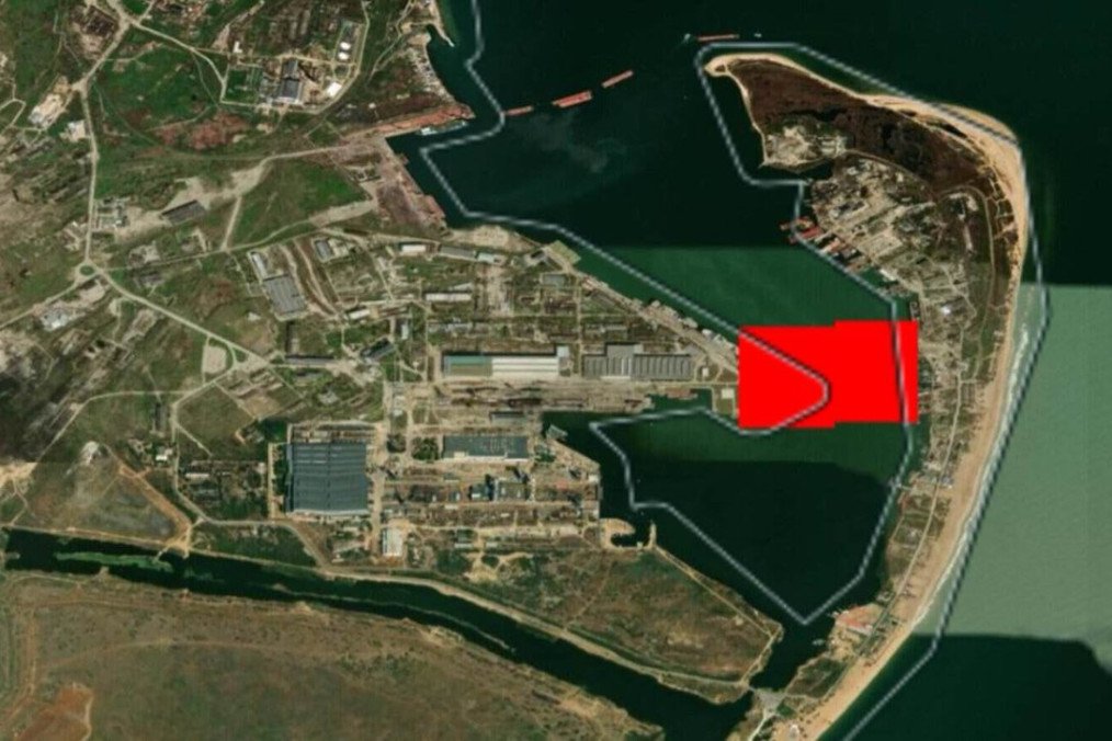 The satallite image shows a fire broke out following a drone strike on the Zaliv shipbuilding plant in occupied Kerch. (Source: MilitaryNewsUA/X)