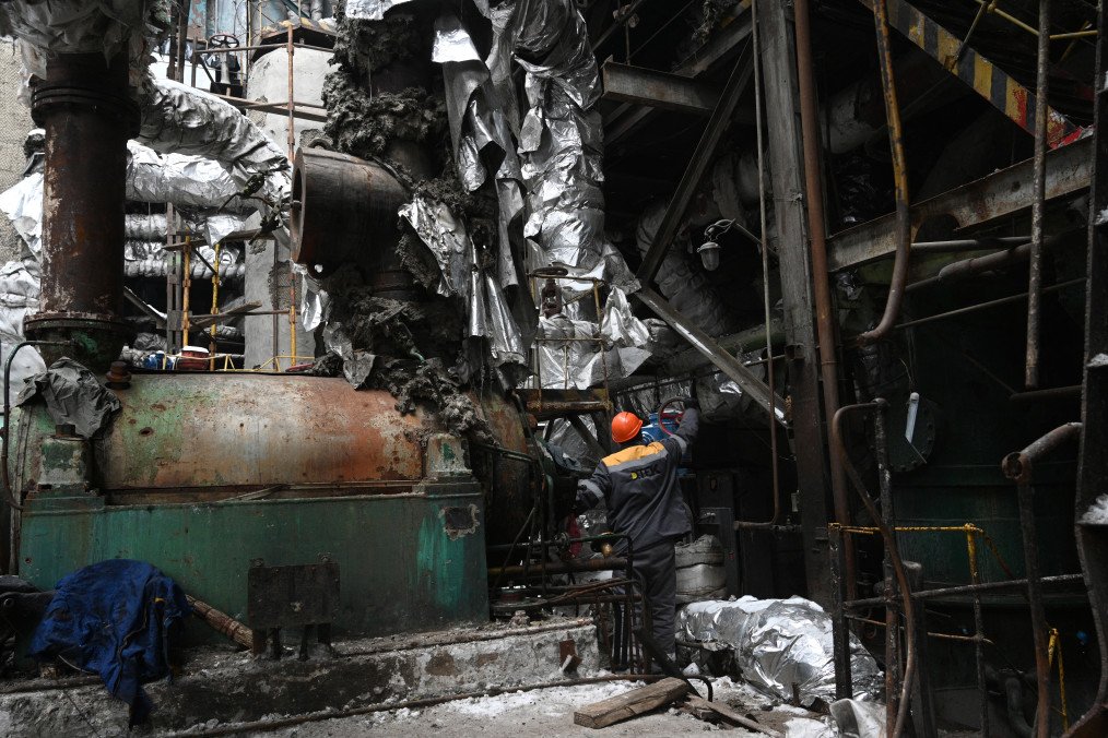 An employee inspects the building of a power plant of Ukrainian energy provider DTEK, which was heavily damaged during air attacks, at an undisclosed location on January 23, 2026. (Source: Getty Images) An employee inspects the building of a power plant of Ukrainian energy provider DTEK, which was heavily damaged during air attacks, at an undisclosed location on January 23, 2026. (Source: Getty Images)