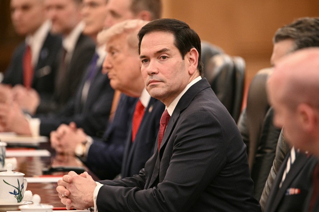 Secretary of State Marco Rubio (C) looks on as US President Donald Trump meets with China’s President Xi Jinping at the Great Hall of the People in Beijing on May 14, 2026. (Source: Getty Images)