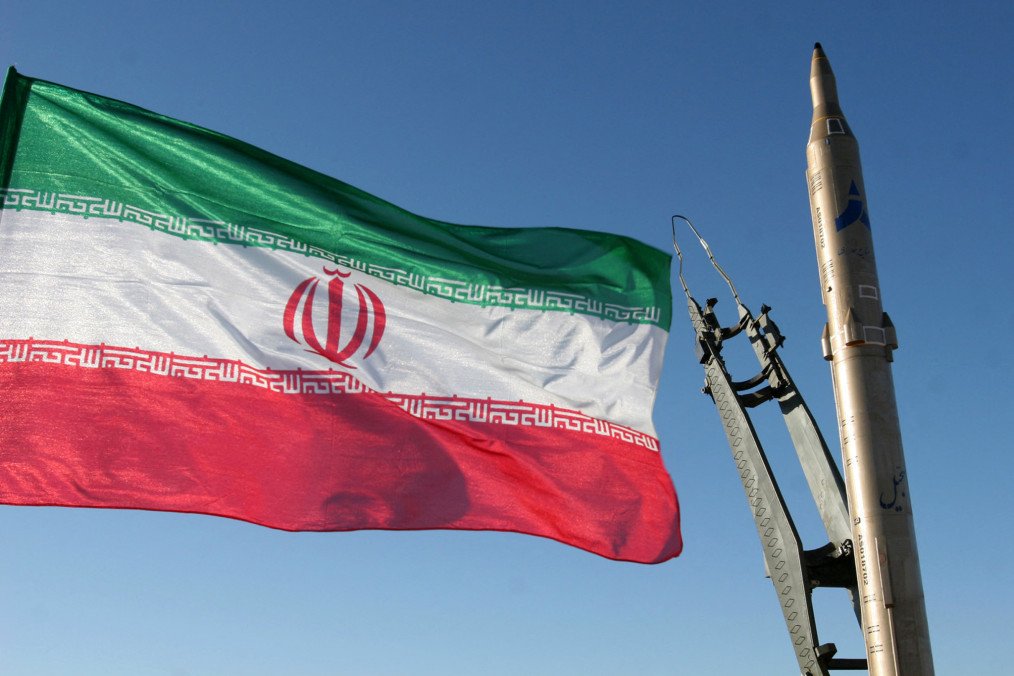 An Iranian flag stands beside a ground-to-ground Sajil missile prior to a test launch at an undisclosed location in Iran on November 12, 2008. Illustrative photo. (Source: Getty Images) An Iranian flag stands beside a ground-to-ground Sajil missile prior to a test launch at an undisclosed location in Iran on November 12, 2008. Illustrative photo. (Source: Getty Images)