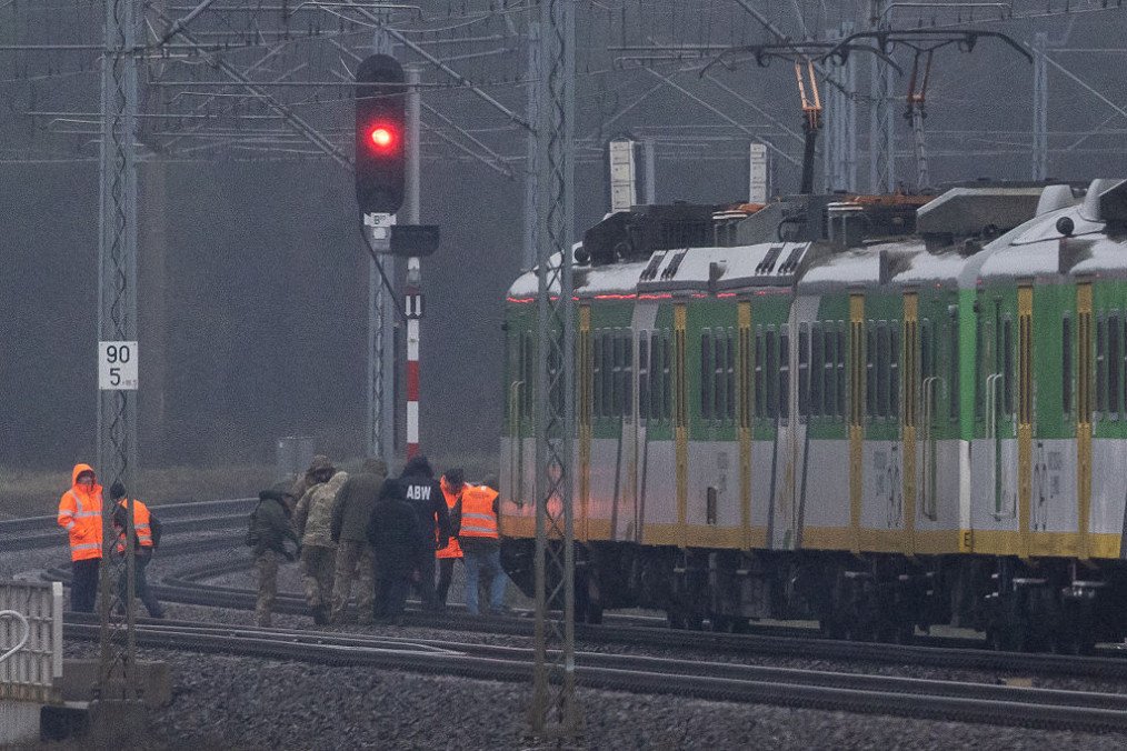 Investigators examine the railways damaged in an explosion on the rail line in Mika, next to Garwolin, central Poland on November 17, 2025, after the line presumably was targeted in a Russian sabotage act. (Source: Getty Images)