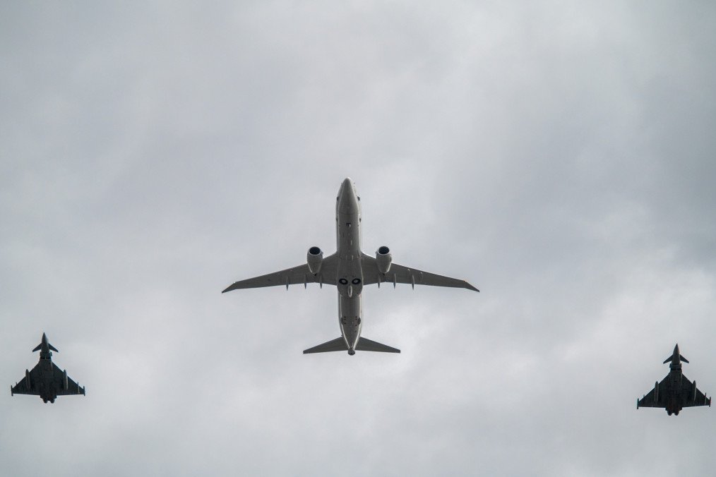 A P-8 Poseidon and two Eurofighter Typhoons fly over The Mall in London during a VE Day flypast on May 5, 2025. (Source: Getty Images)