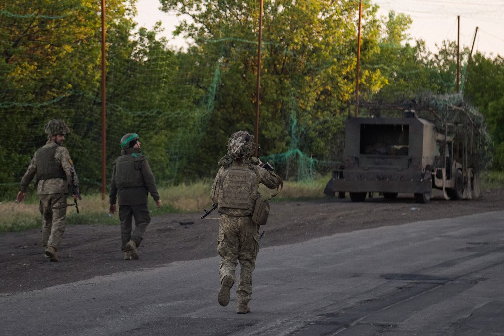 Servicemen of the Armed Forces of Ukraine secure a frontline road after detecting a Russian FPV drone in the Donetsk region on May 27, 2026, in Donetsk, Ukraine.