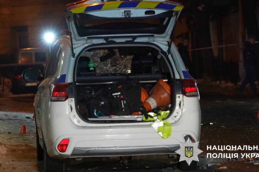 A damaged patrol police vehicle stands at the scene of the explosions in central Lviv, with debris scattered across the street. (Source: National Police of Ukraine)